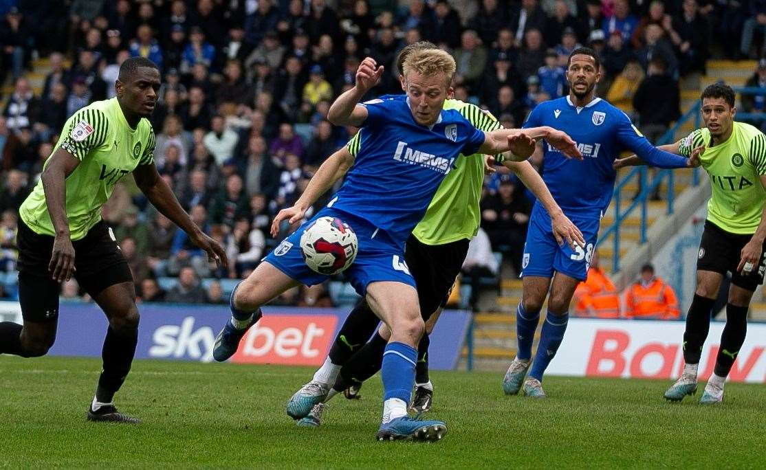 Gillingham in action against Stockport County in League 2 last season - the sides meet at Edgeley Park on the opening day of the new campaign.