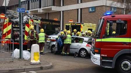 Members of the emergency services at the scene. Pictures: JIM RANTELL