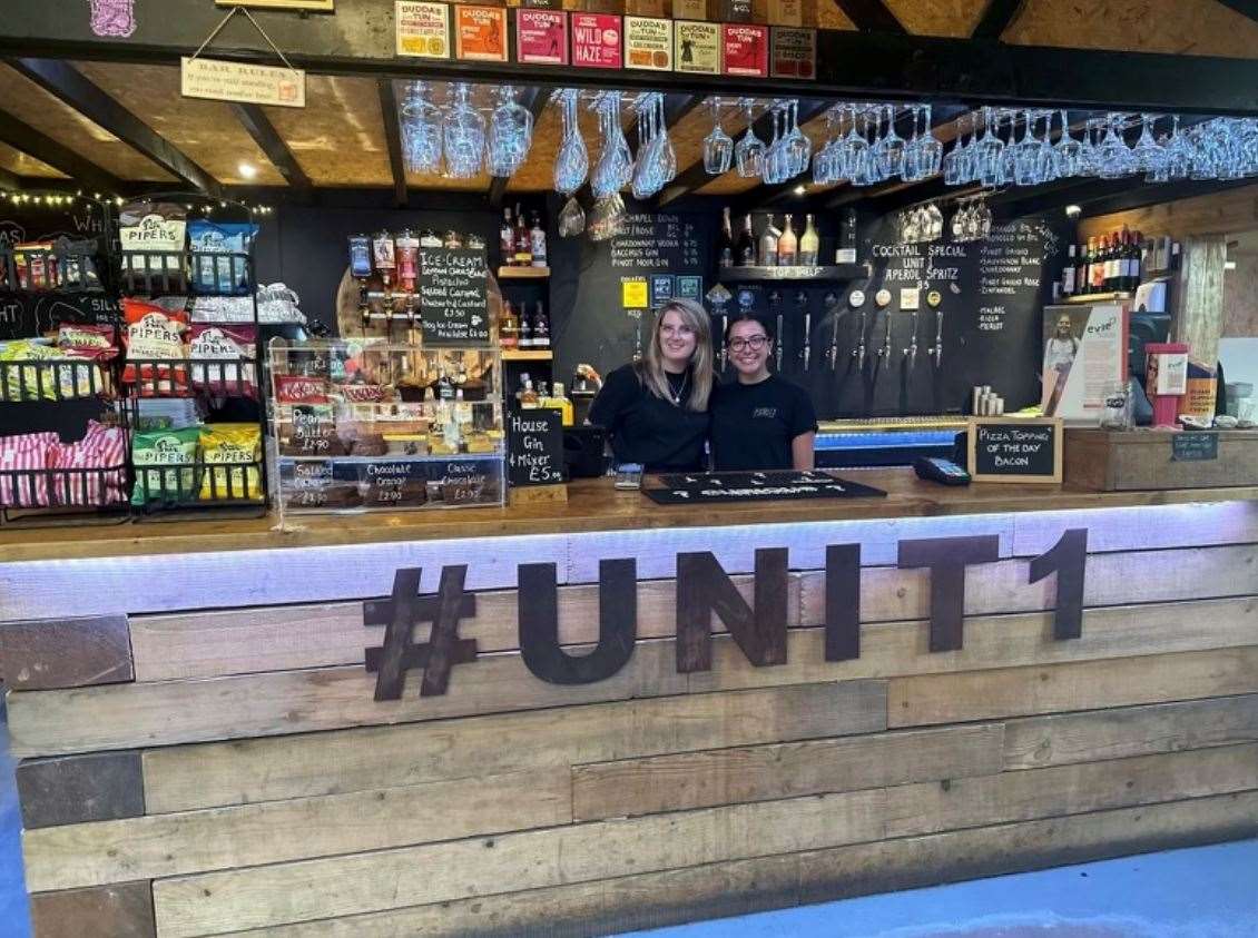 Staff behind the bar at the Unit 1 pub in West Hythe. Picture: Kenza Bowman