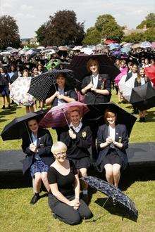 Pupils from Rochester Grammar School for Girls smash the world record for the biggest recorded umbrella dance