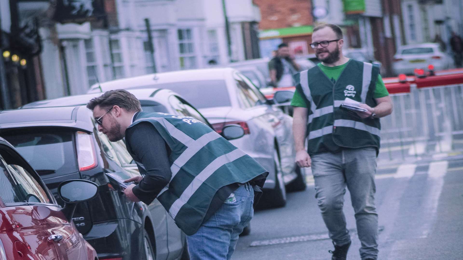 Green Party air pollution campaigners speakign to drivers in St Dunstan's