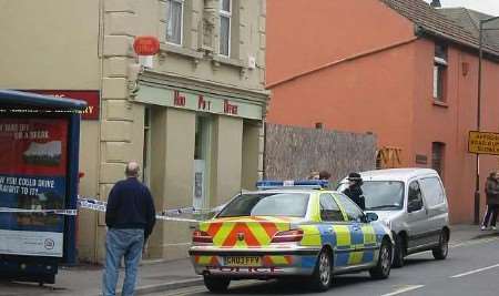 Police outside the post office shortly after the robbery attempt