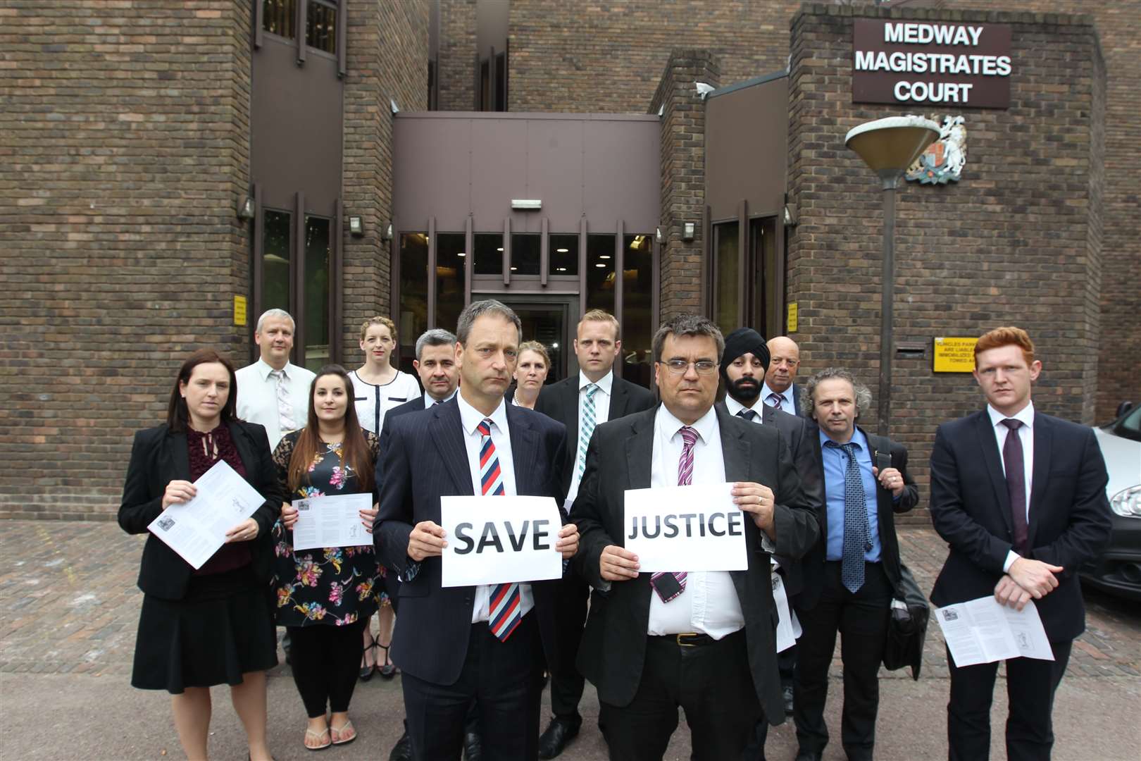 solicitors on strike protesting about cuts to legal aid.