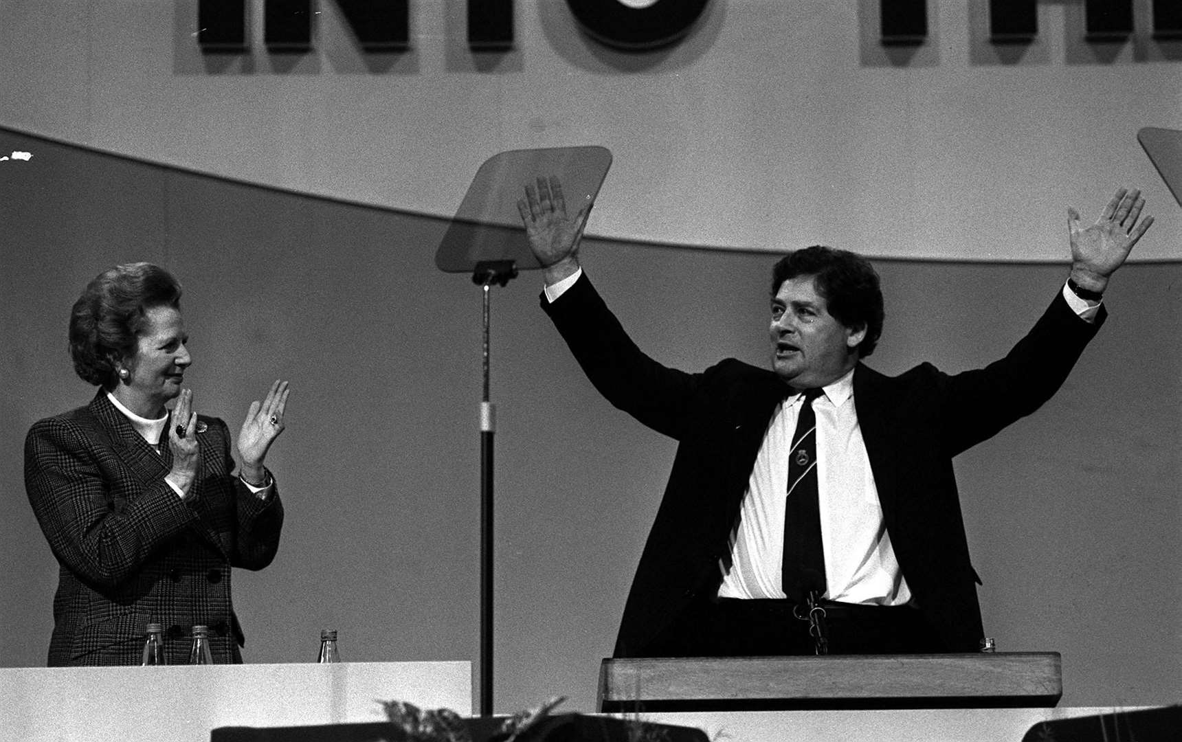 Nigel Lawson with Margaret Thatcher at a Tory conference (PA)