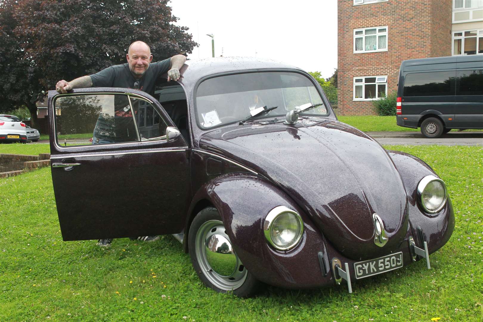 Chris Bramwell with his rebuilt VW Beetle called Firebug