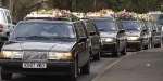 The funeral procession included more than 60 vehicles