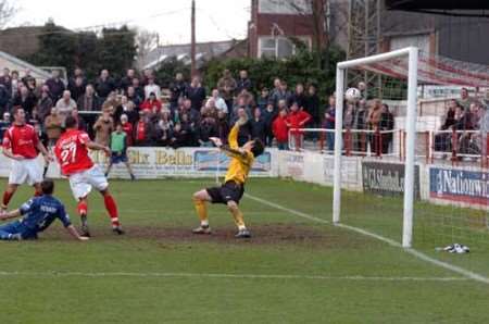 Joel Ledgister smashes in Fleet's winner. Picture: STEVE CRISPE