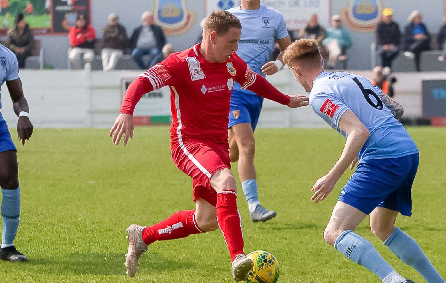Whitstable striker Charlie Heatley turns inside Liam Hendy during Whitstable's loss to Lancing last Saturday. Picture: Les Biggs