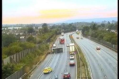 The overturned caravan on the M20