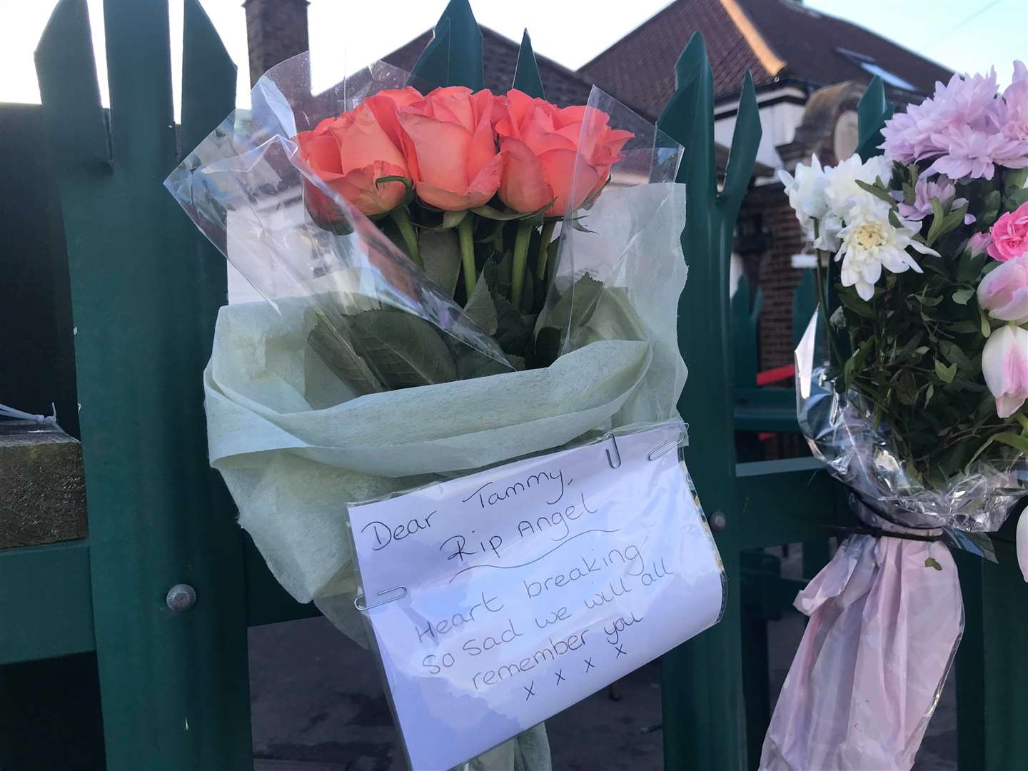 Flowers and messages have been left outside the school