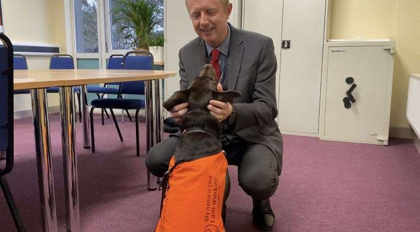 Headteacher, Chris Norwood, with Cleo