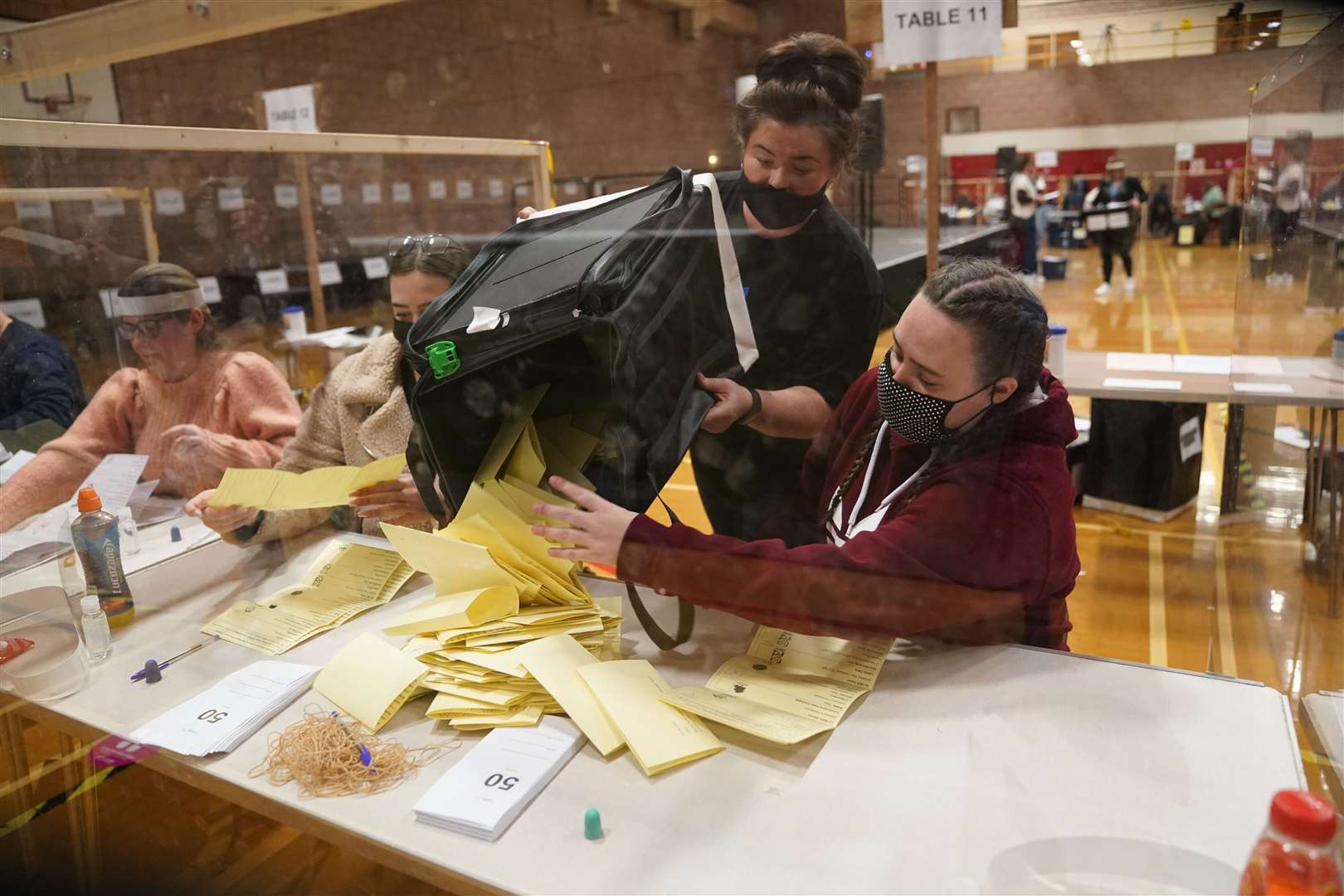 Ballot boxes are emptied at Mill House Leisure Centre in Hartlepool (Owen Humphreys/PA)