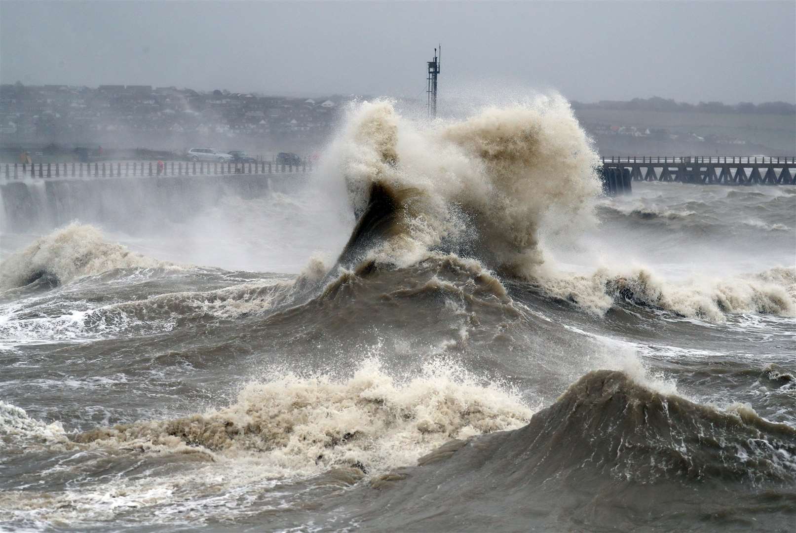 Waves crashed into the sea wall at Newhaven in East Sussex as Storm Ciara hit the UK in February (Andrew Matthews/PA)