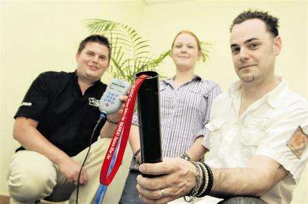 Craig Harrison, Gemma Peacock and Chris Peacock of Aquaread with their new water testing device