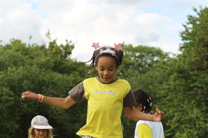 Nine-year-old Mary practices hopscotch