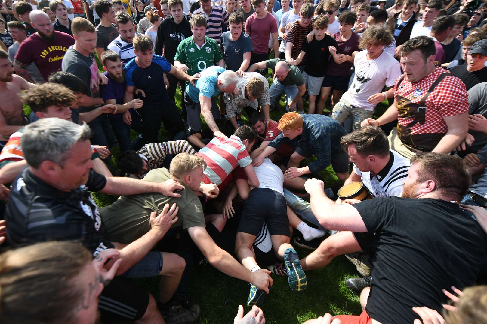 A traditional game of bottle-kicking, played on Easter Monday between the neighbouring villages of Hallaton and Medbourne in Leicestershire (PA)