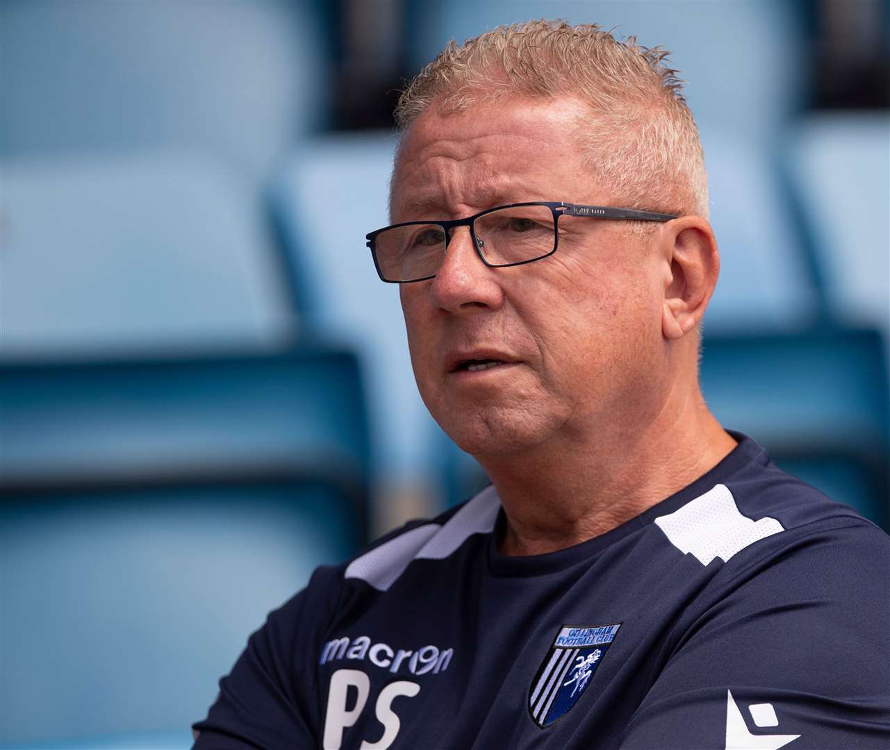 Gillingham chairman Paul Scally takes a cut in fees as club makes over £500k loss