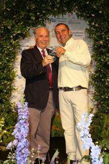 Malcolm Moore, chairman of Sittingbourne in Bloom receives his award from Chris Collins, the Blue Peter gardener.