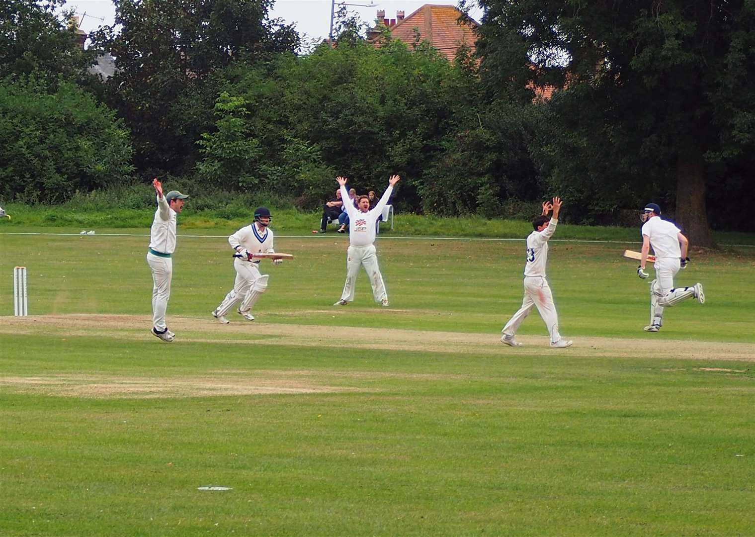 Bernard Plaister was on hand as these cricketers went up in Selling Road on September 4