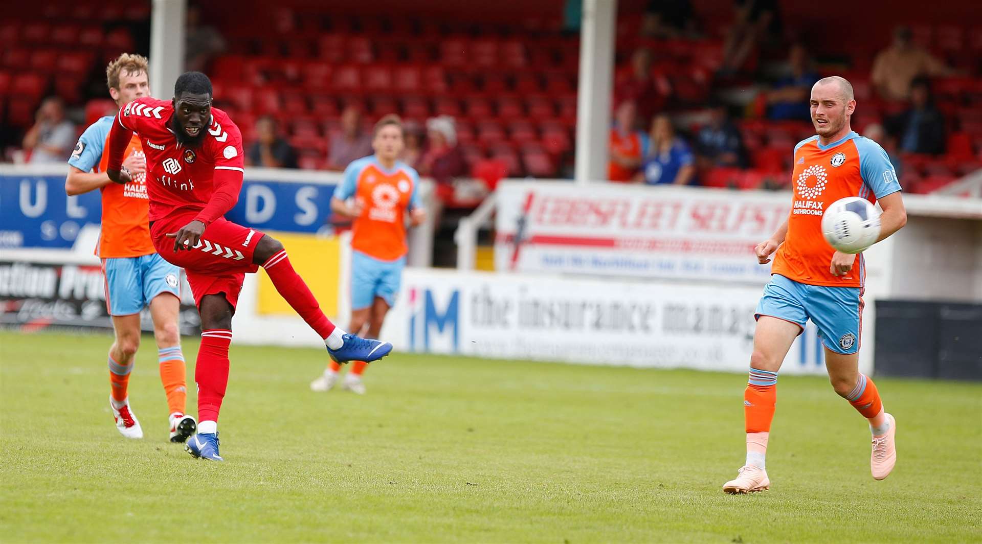 Ebbsfleet's Ayo Obileye gets a shot away against Halifax Picture: Andy Jones