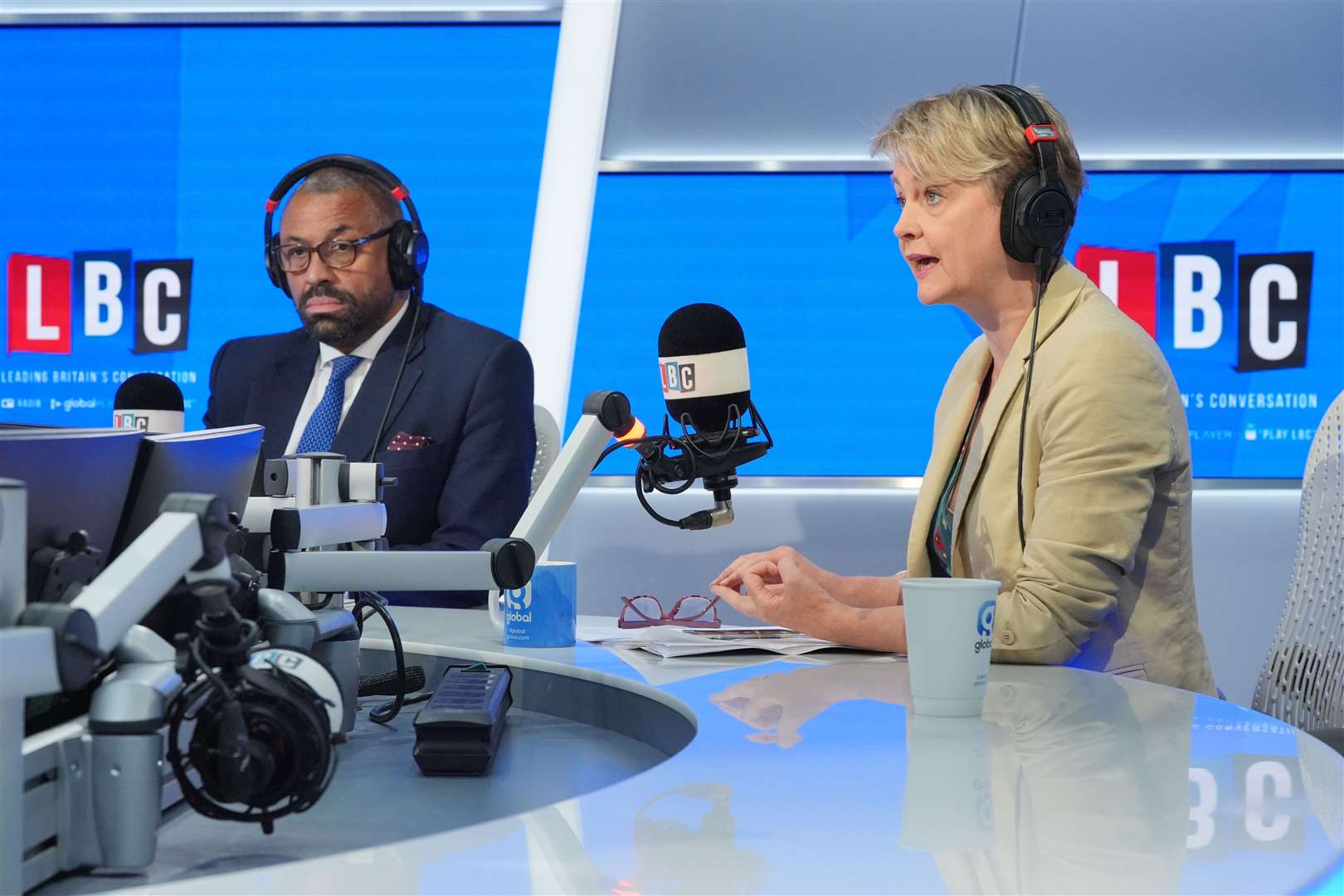 James Cleverly and shadow home secretary Yvette Cooper take part in a live immigration debate on LBC (Jonathan Brady/PA)