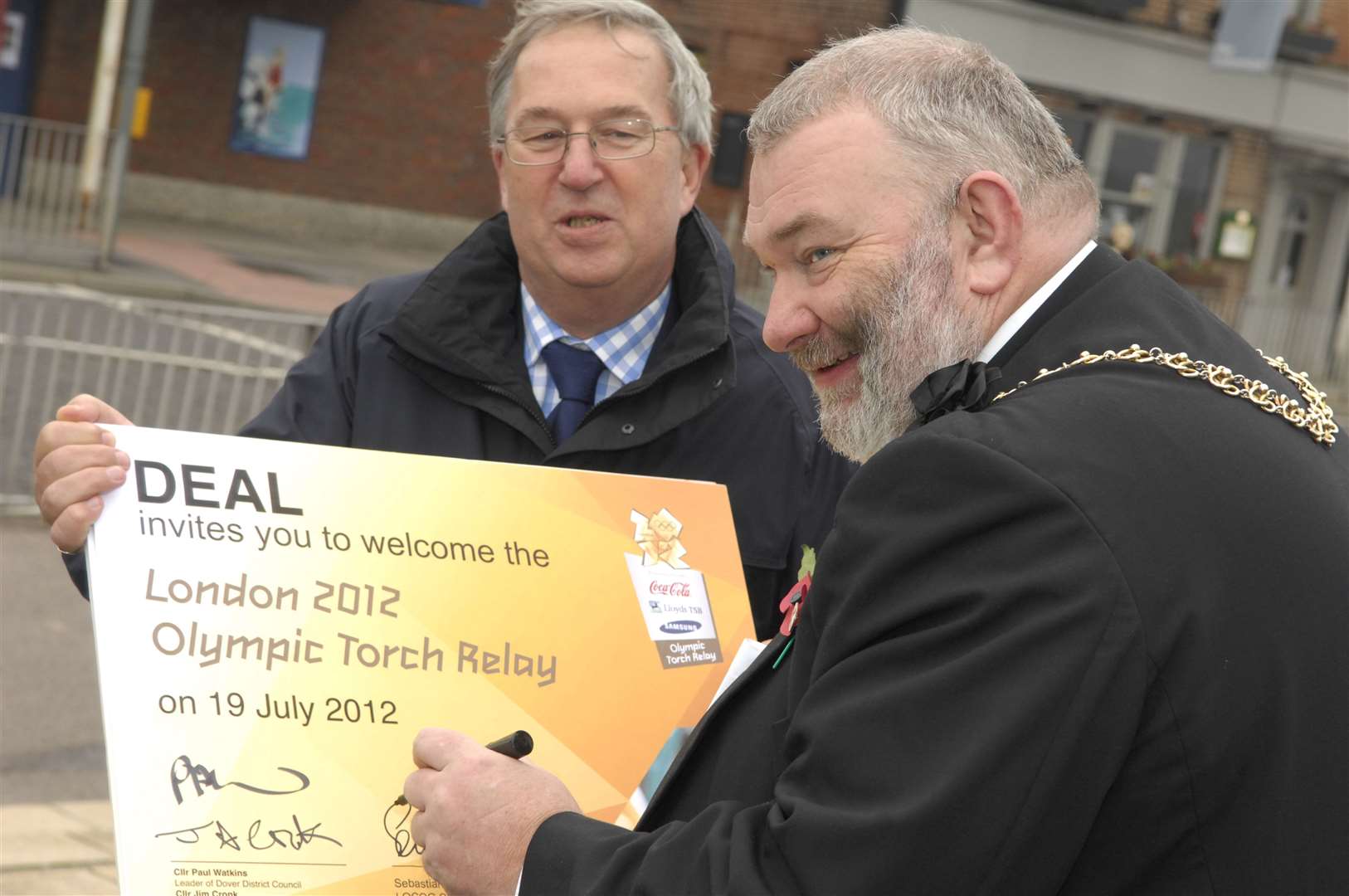 Cllr Paul Watkins and Mayor Cllr Jim Cronk from Dover District Council announce where in the district the Olympic flame will be carried