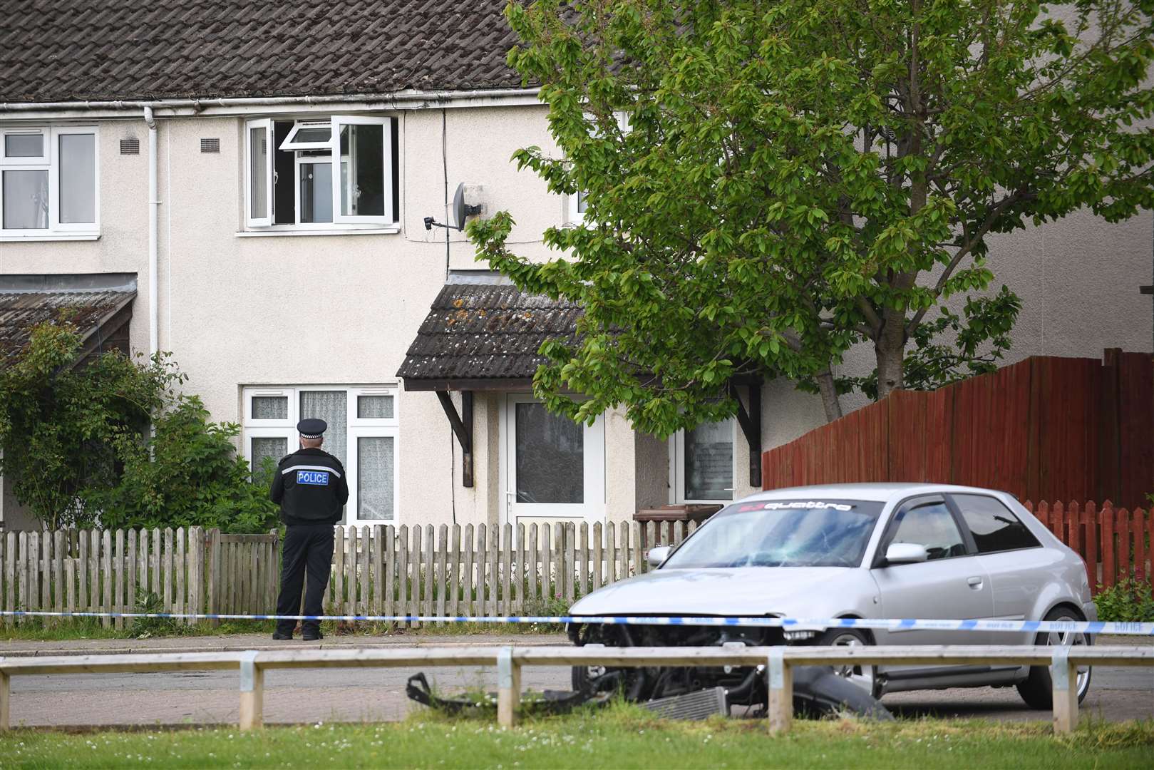 A police officer near the scene in Constable Road, Corby, following the fatal stabbing of a 16-year-old boy on Tuesday (Joe Giddens/PA)