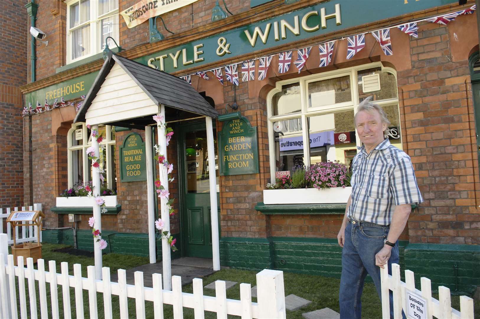 Dave Savory outside his pub