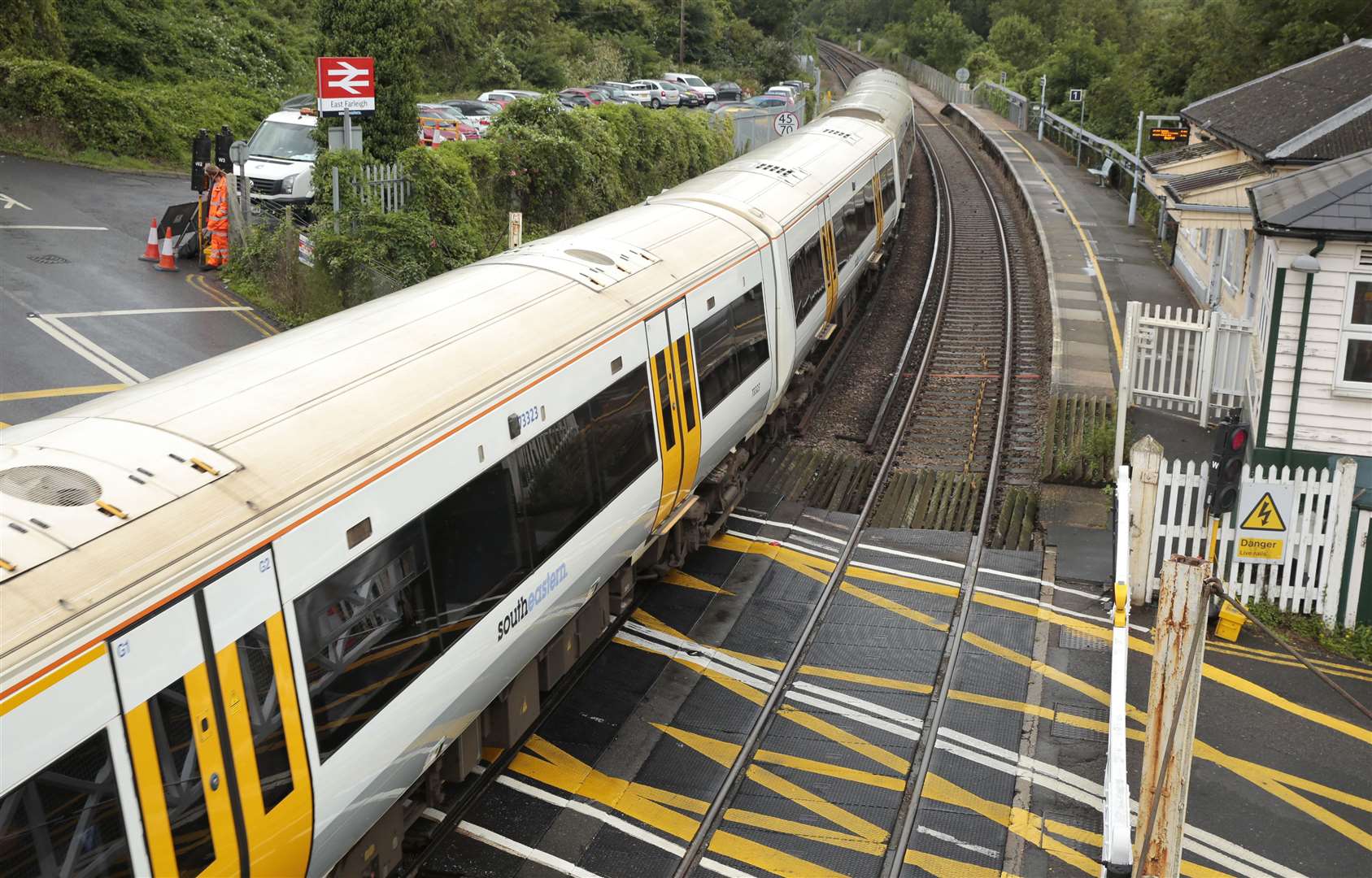 Traffic lights being activated ahead of a train passing East Fairleigh level Crossing, Maidstone. Picture: Martin Apps