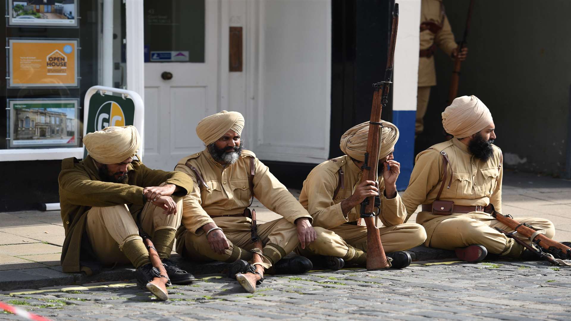 Actors taking a break in the town centre