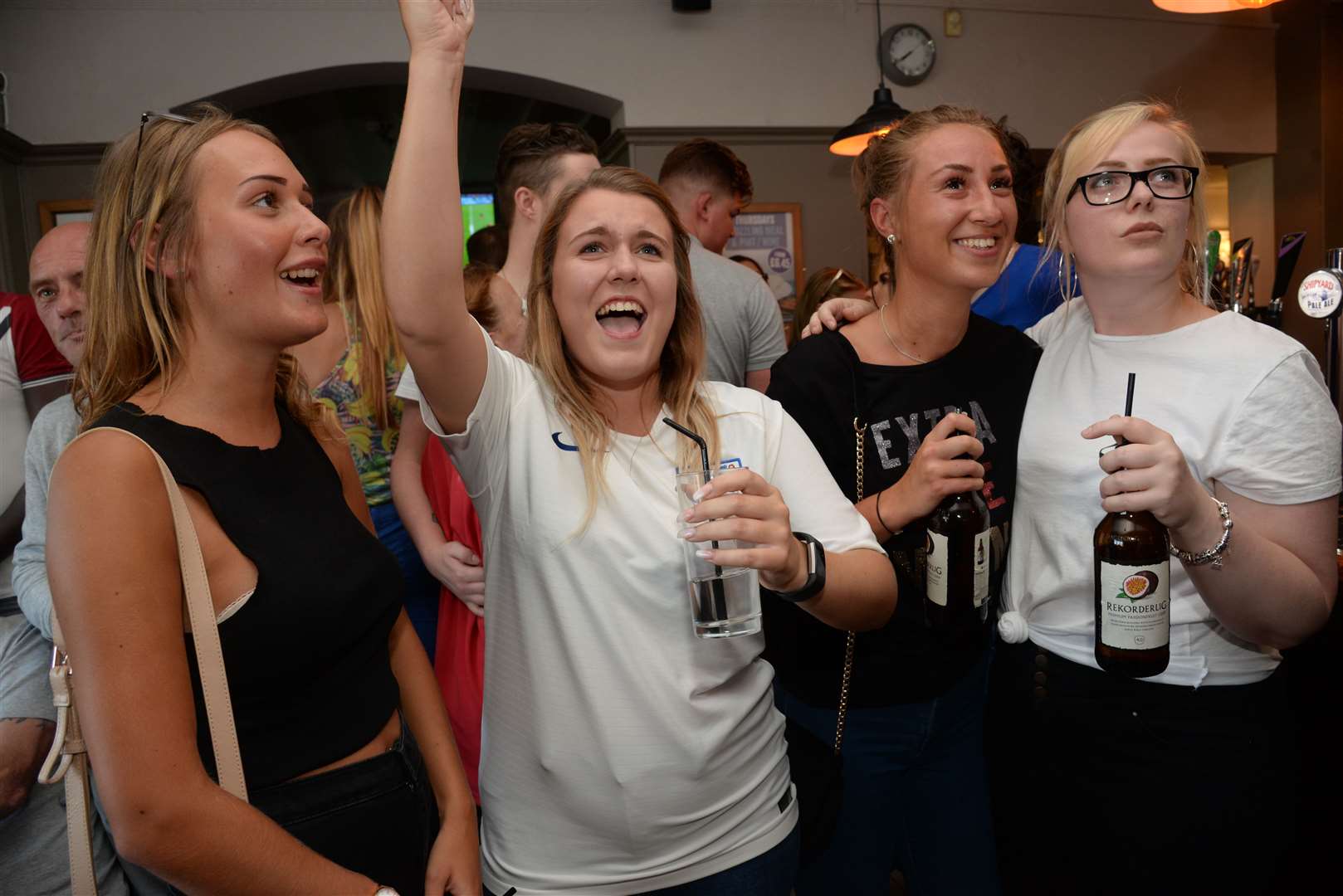 Fans in good cheer watching the first half