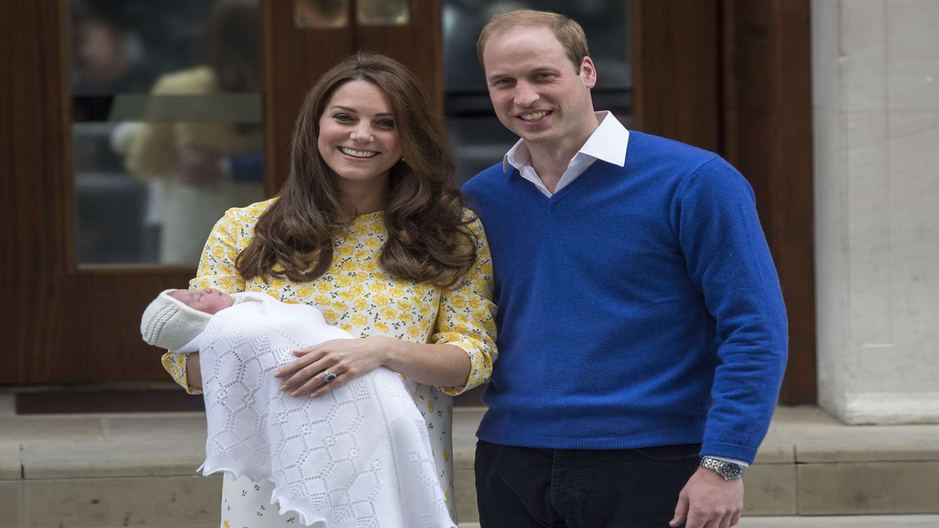 Princess Charlotte with her proud mum and dad