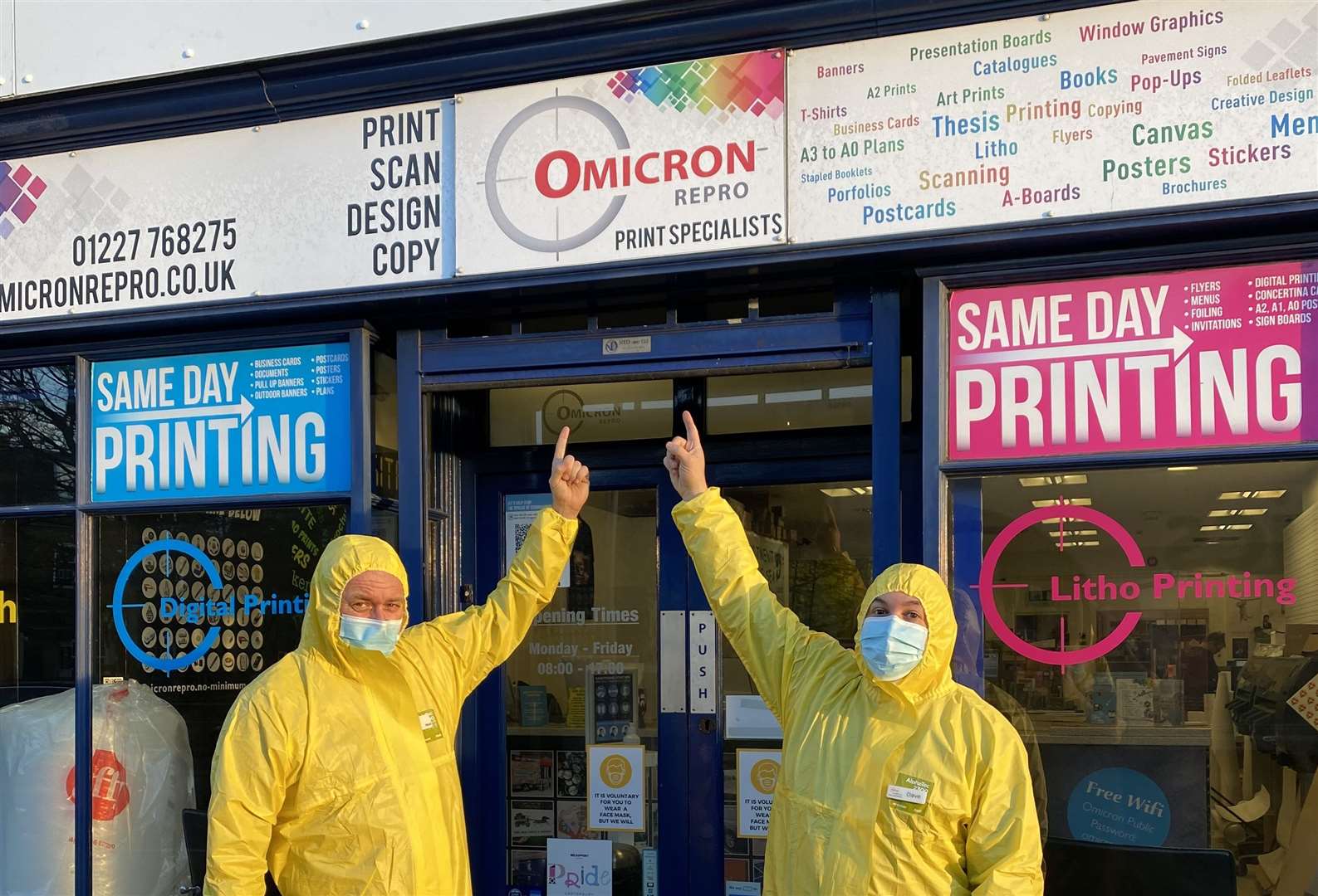 Omicron Repro owner Mark Fawcett-Jones and director Dave Loveridge have posed outside the Canterbury store in Breaking Bad costumes. Picture: Omicron Repro