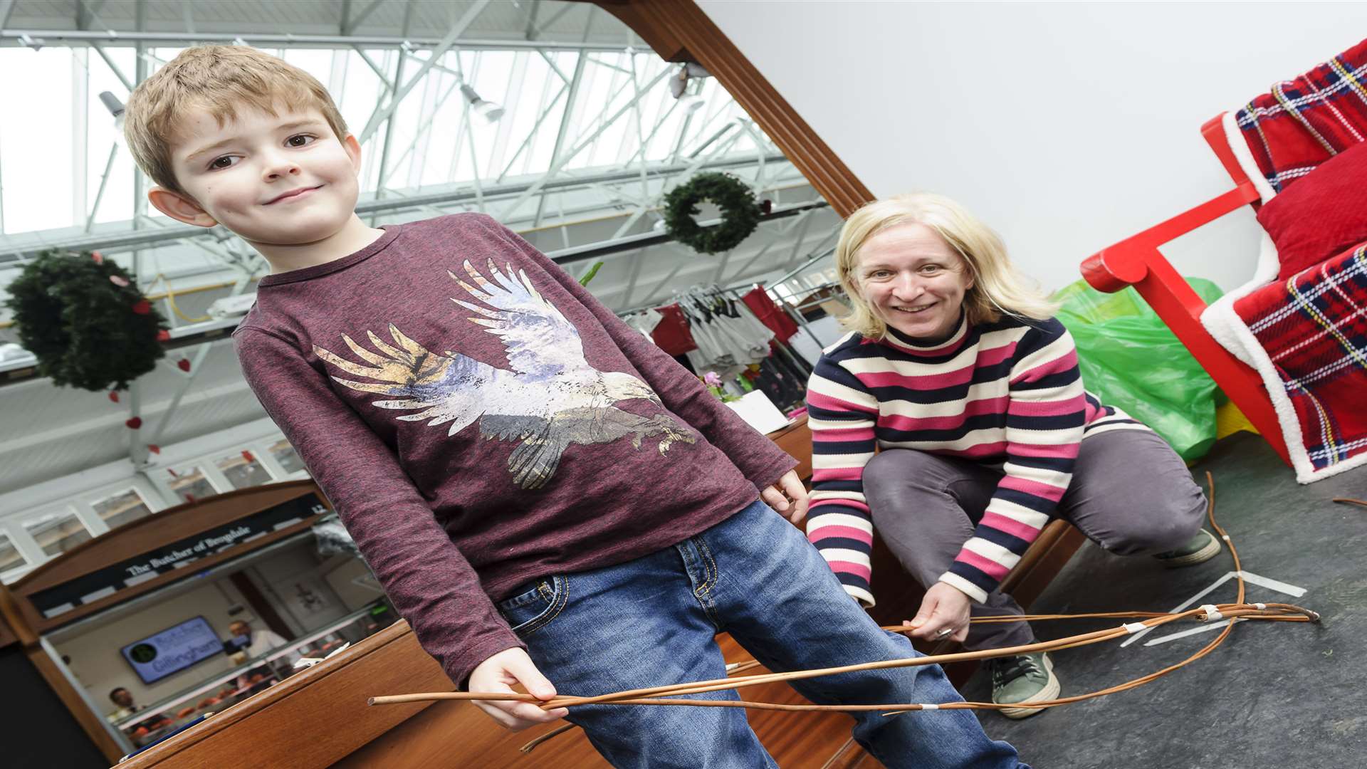 Using bamboo canes to create giant feathers. Picture: Andy Payton