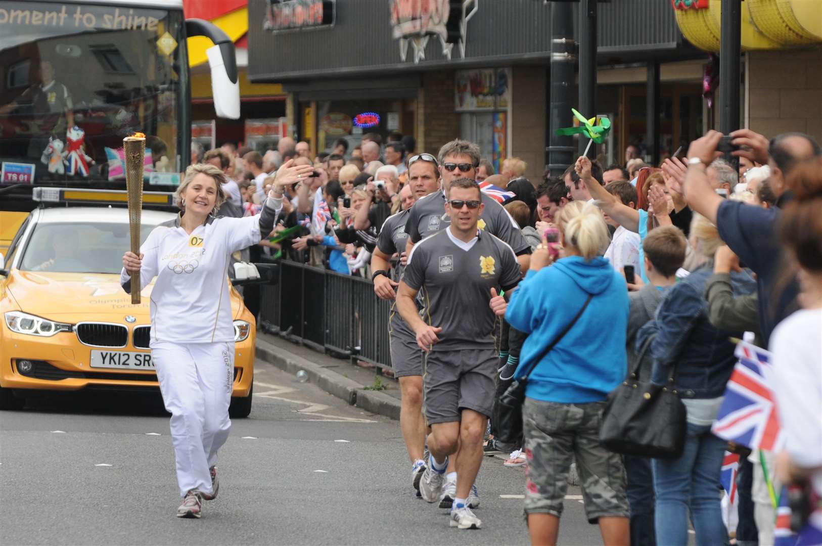 Thousands turned out to see the Olympic flame be carried through Kent in 2012