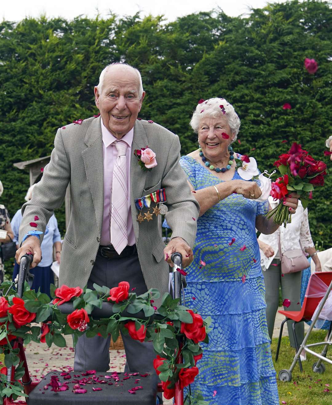 Fred Cobbett, who is a keen gardener, grew the roses for Monica’s bouquet (Steve Parsons/PA)