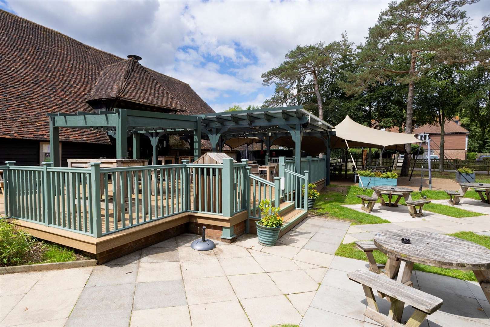 The Singleton Barn's spacious garden has undergone a refurbishment. Picture: Shepherd Neame