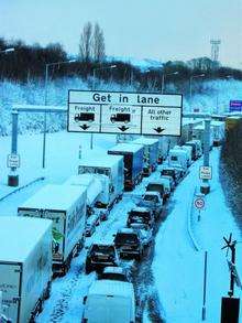 Lorries queue to use the Channel Tunnel