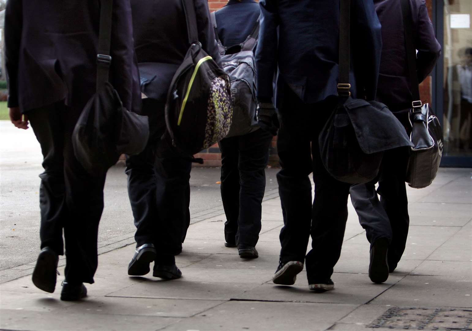 Secondary school-aged children are often bussed more than 10 miles away. Picture: David Jones/PA