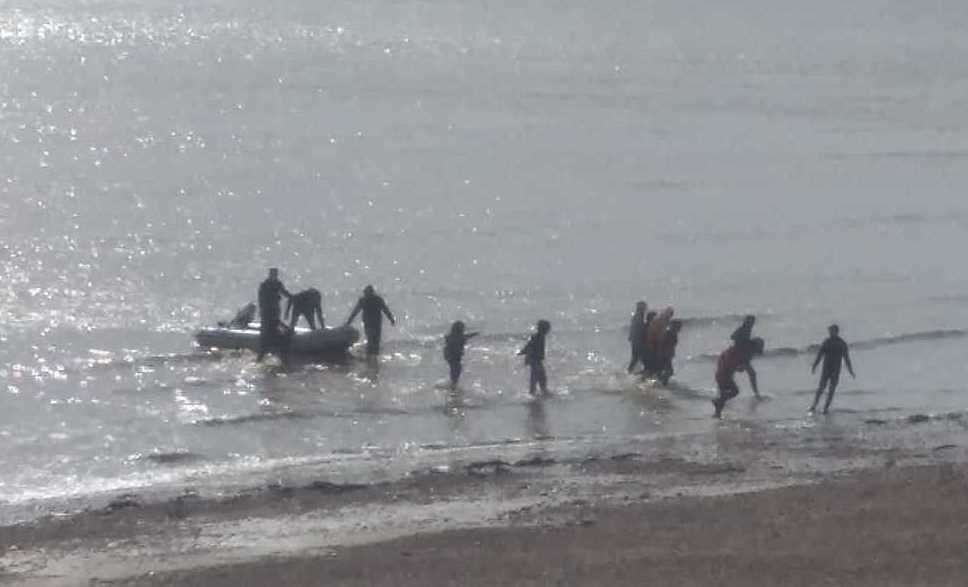 People landing on the Kinsgdown shore after crossing the Channel. Picture Christian Thrale