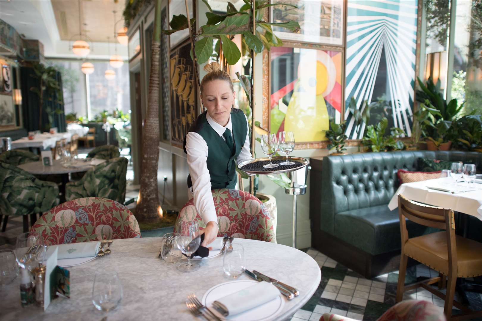 Staff at the Ivy Victoria in London, one of dozens of Ivy Collection sites (Stefan Rousseau/PA)