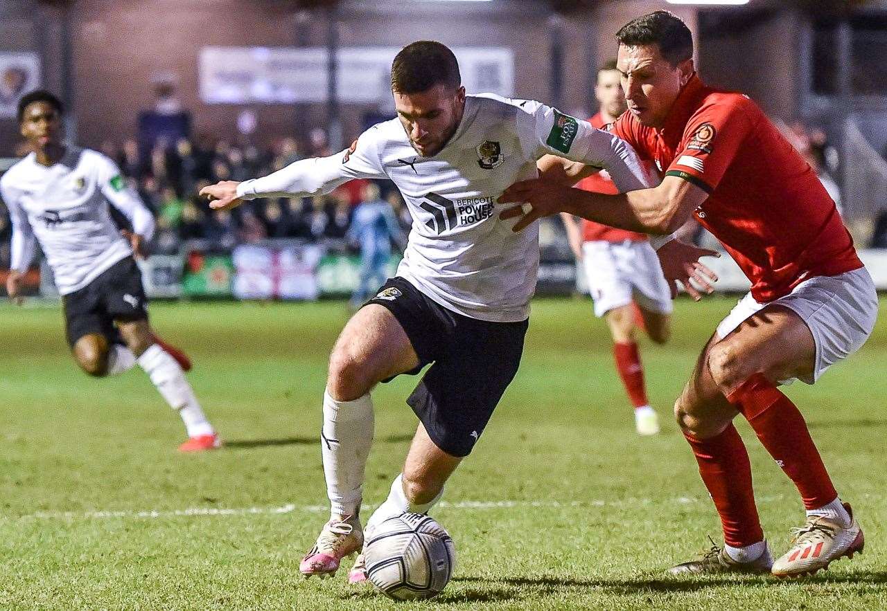 Dartford's Danny Leonard looks to get beyond Ebbsfleet's Joe Martin. Picture: Dave Budden