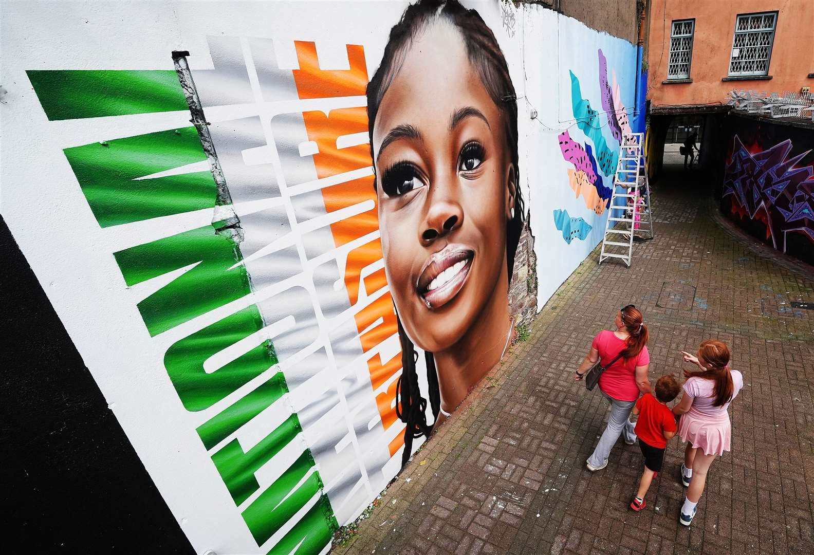 A mural of athlete Rhasidat Adeleke was created in Waterford after she made history becoming the first Irish woman to run in an Olympic sprint final during the Paris Olympics (Brian Lawless/PA)