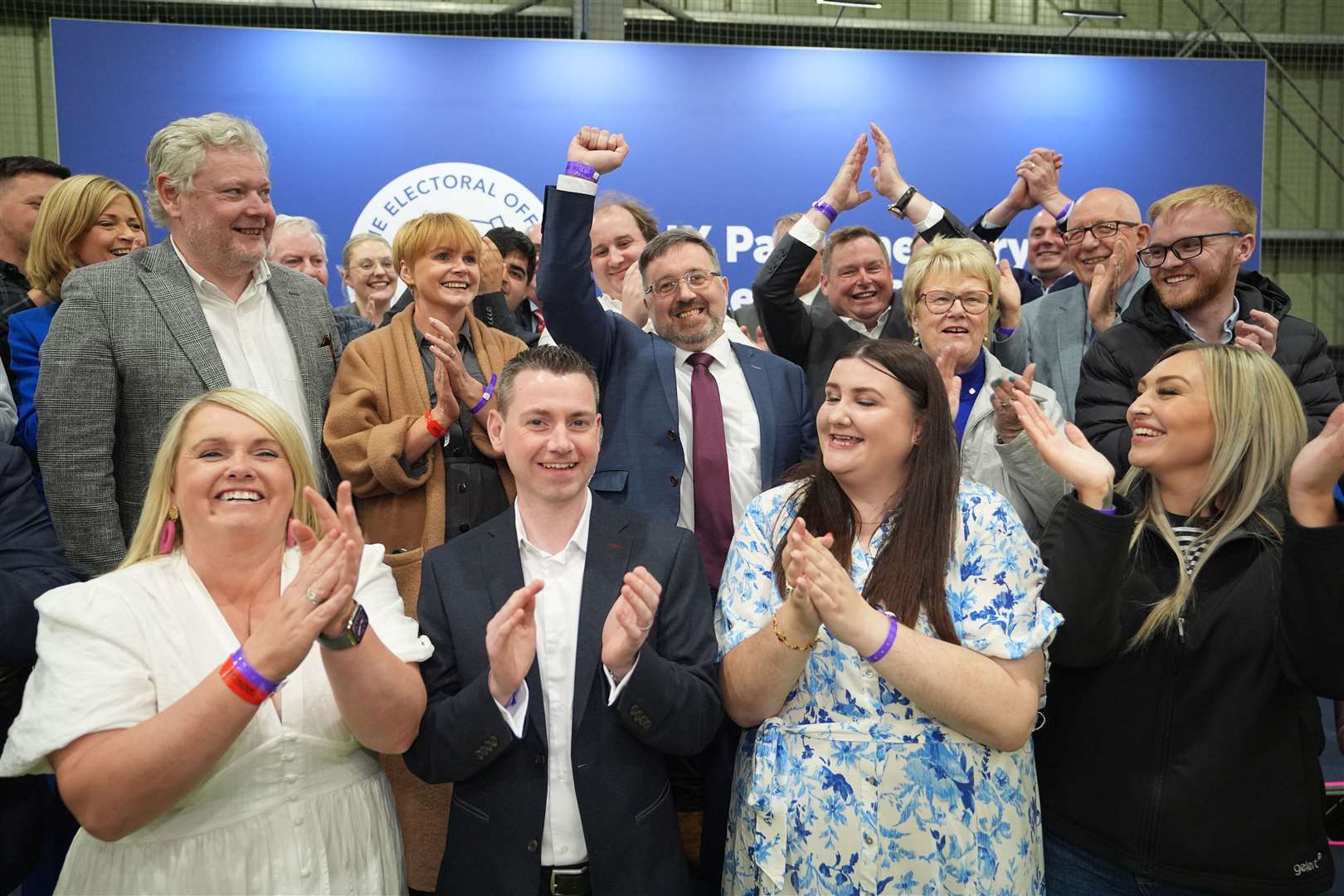 Robin Swann (centre) celebrates becoming MP for South Antrim (Niall Carson/PA).