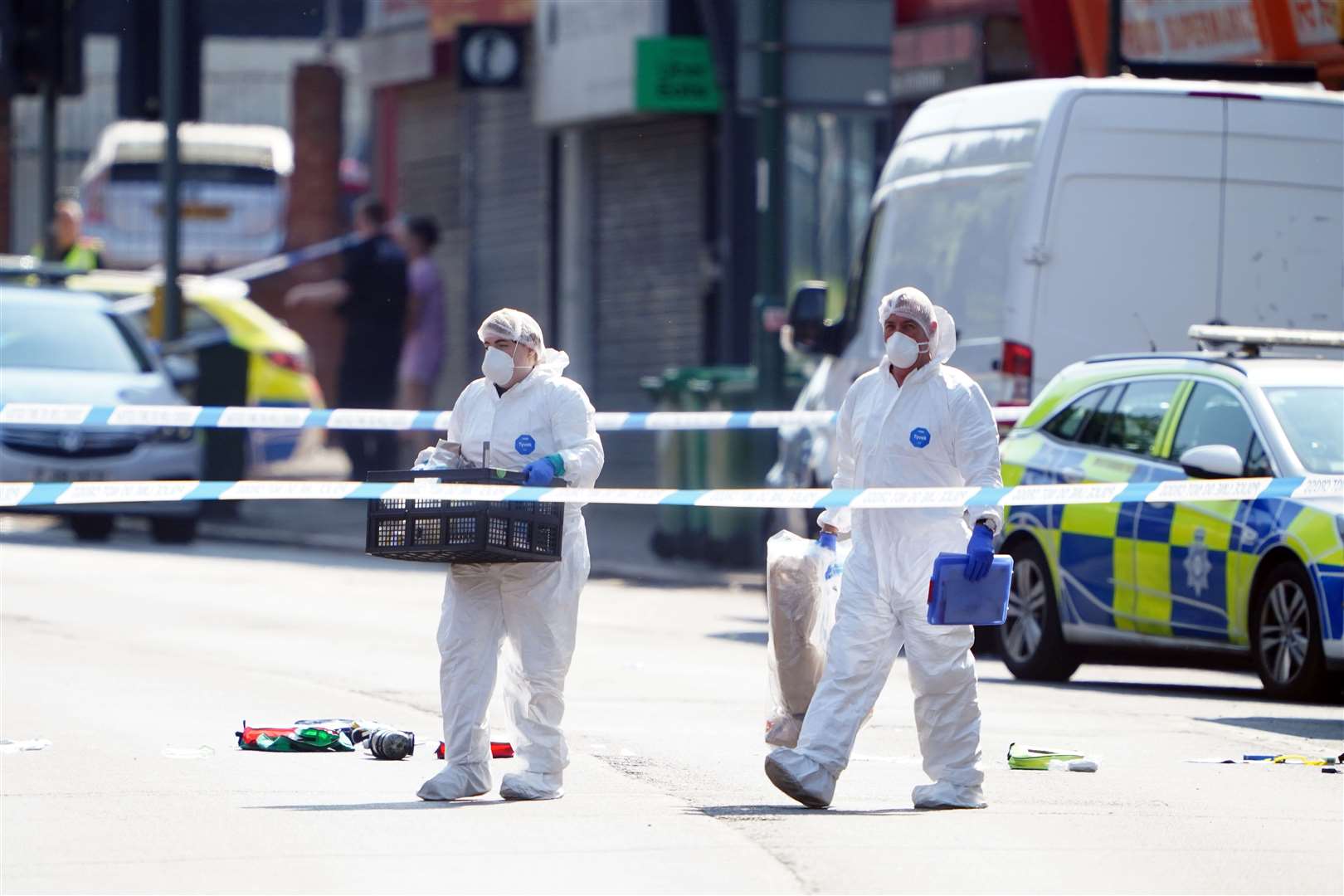 Police forensics officers in Ilkeston Road, Nottingham (Zac Goodwin/PA)