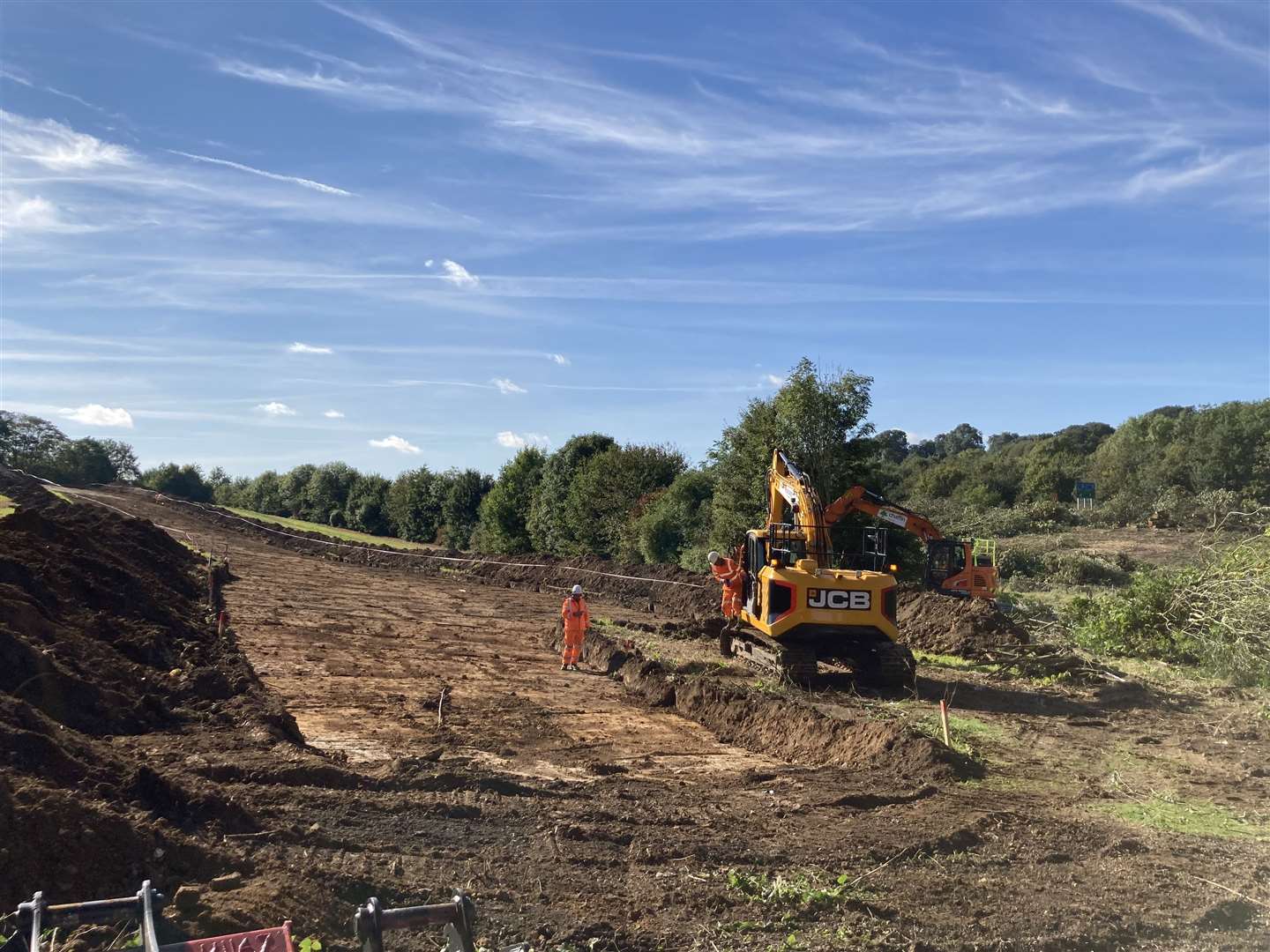 Diggers clearing earth off Maidstone Road for preliminary work on the Stockbury roundabout at Sittingbourne