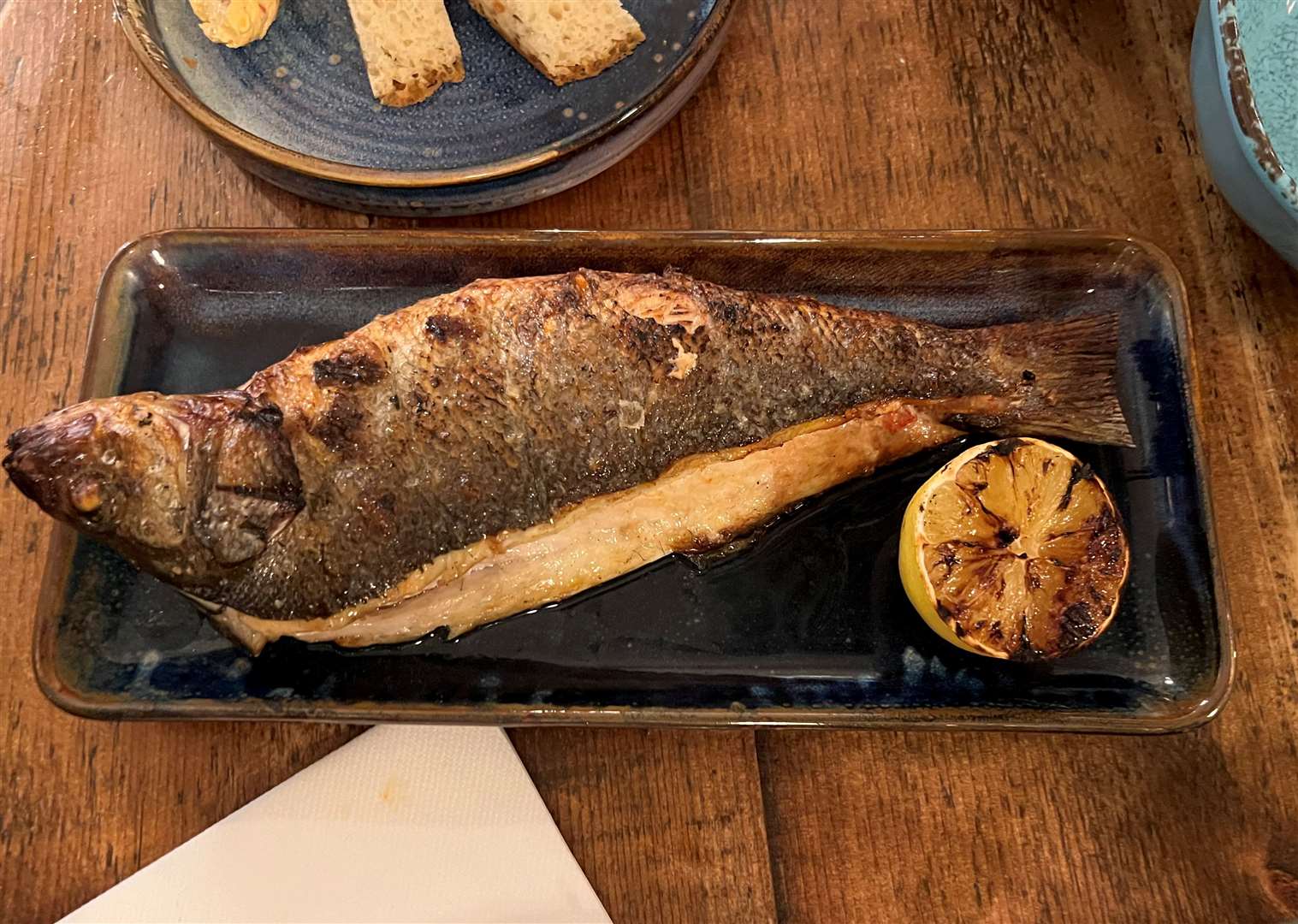 The whole flame-grilled seabass was the big ticket item - and was worth it