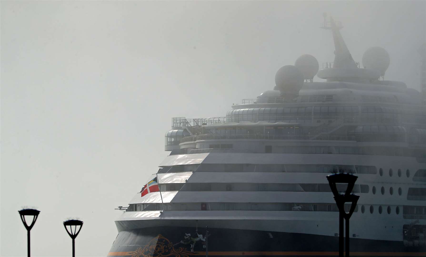 The Disney cruise ship, shrouded in fog, at Dover, Kent (Gareth Fuller/PA)