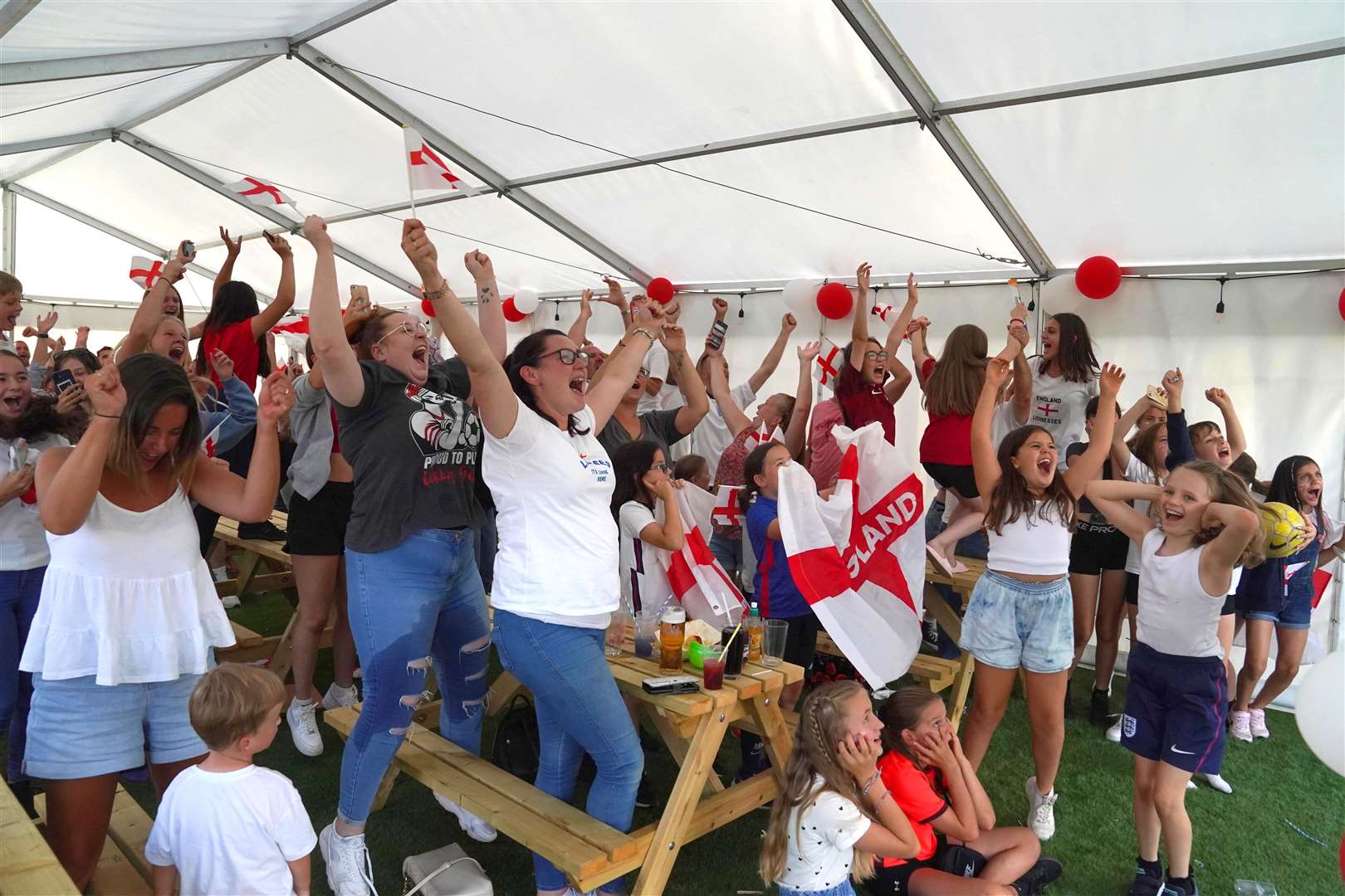 Fans celebrate at Aylesbury United WFC (Steve Parsons/PA)