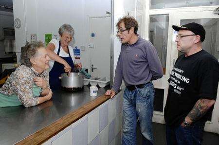 Volunters Ruth Auger and Sue Blaydes chat with Colin and Mark at the Catching Lives Day Centre in Station Road East, Canterbury.